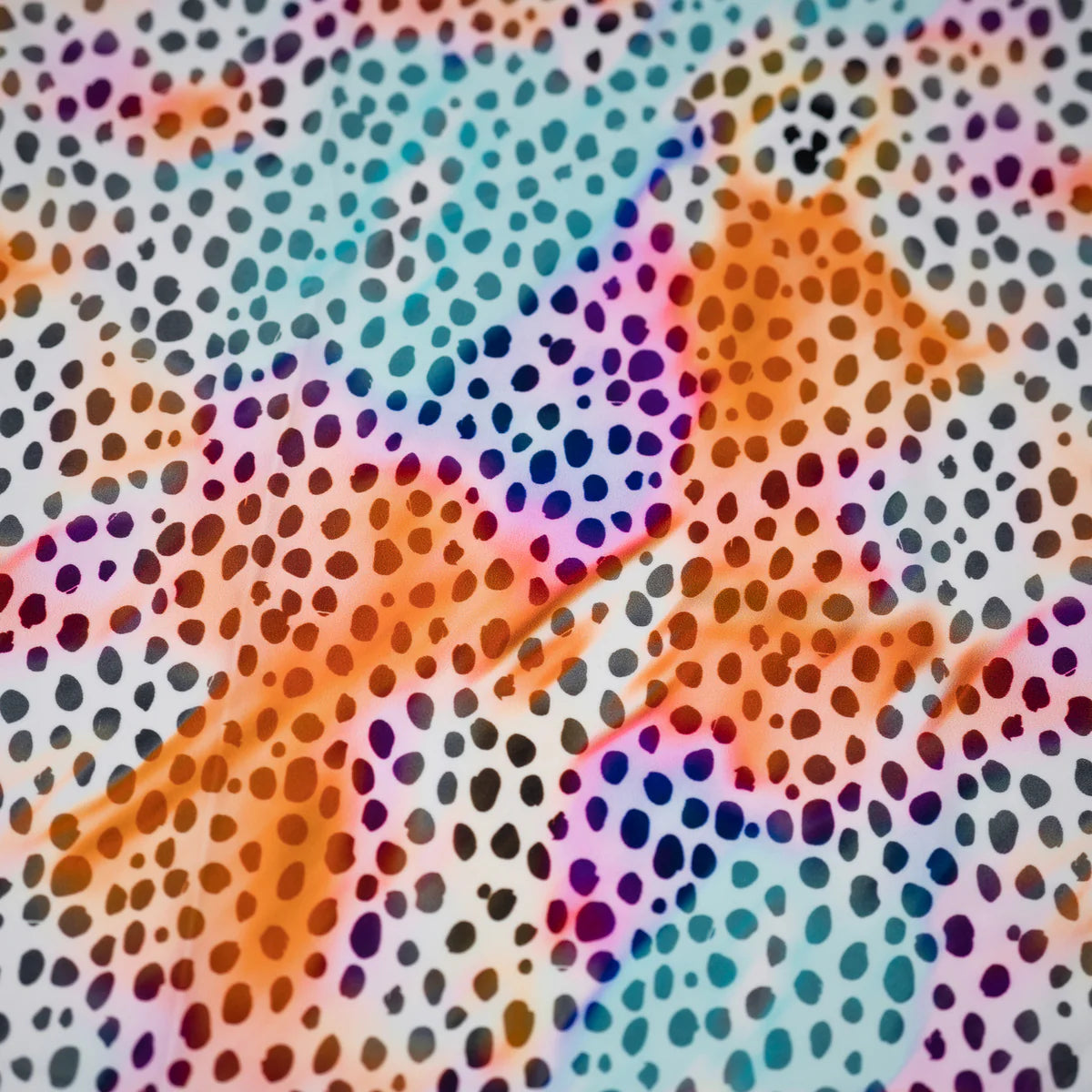 Colorful abstract pattern with multicolored dots on a textured background