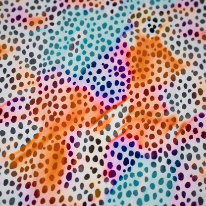 Colorful abstract pattern with multicolored dots on a textured background