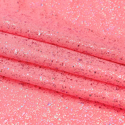 Close-up of coral fabric with glitter texture