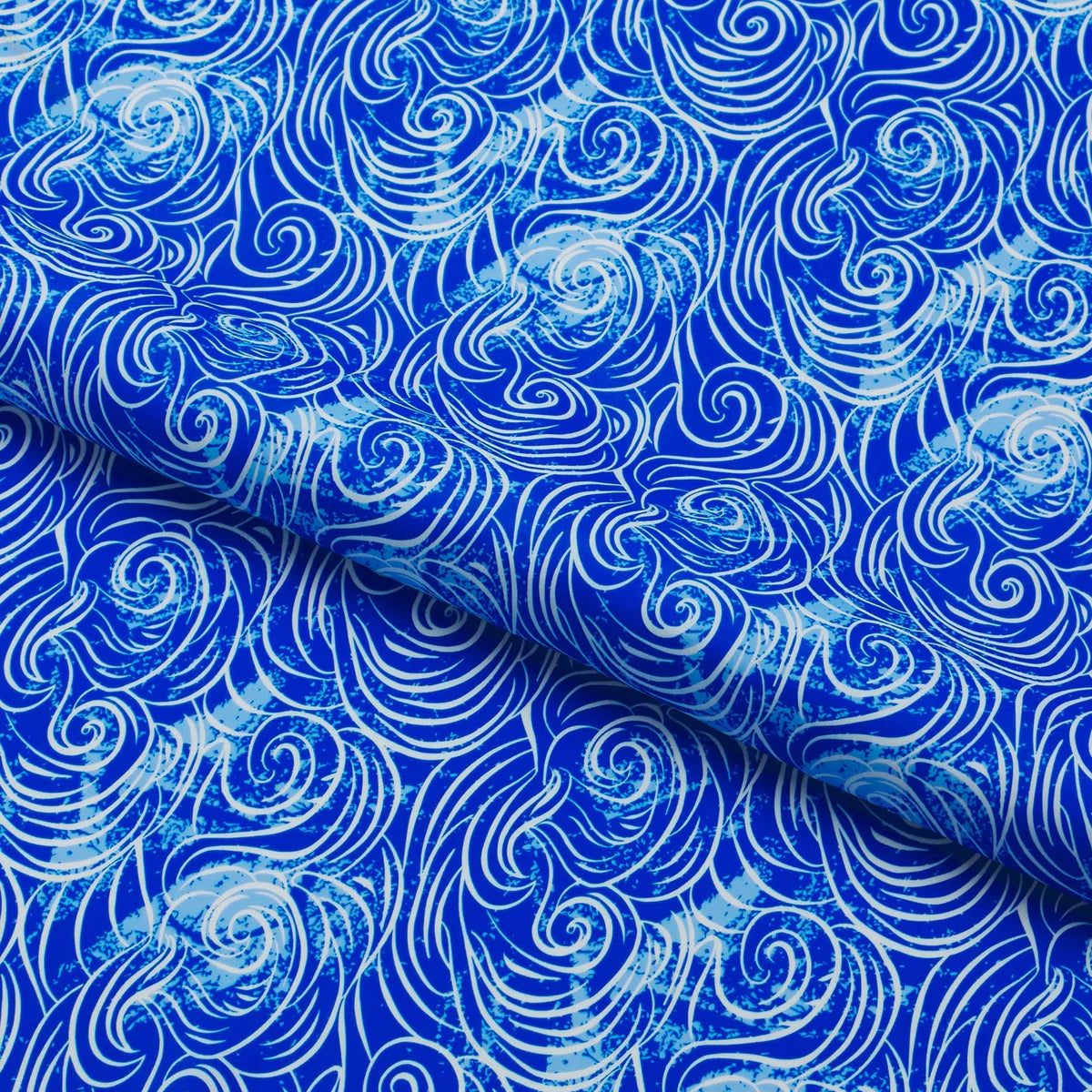 Blue fabric with white wave pattern